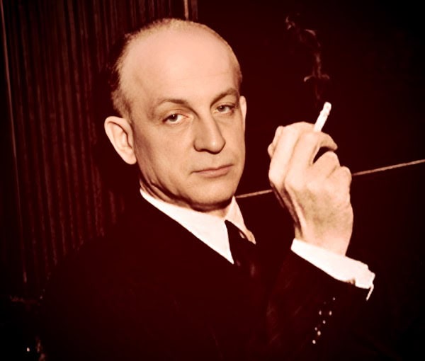 Smoking man in vintage style portrait holding cigarette in a dimly lit room, retro aesthetic, classic ambiance, black and white photo, nostalgic mood.