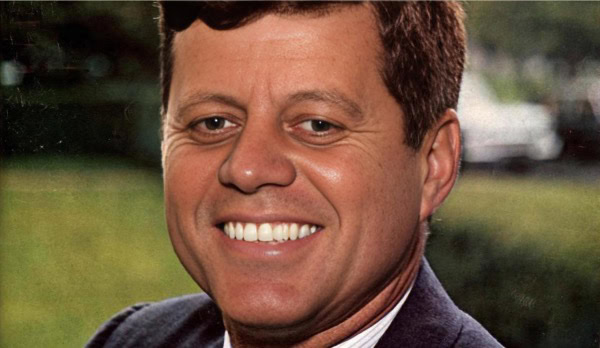 Professional male news anchor smiling, representing historical news and radio broadcasts, emphasizing the importance of audio archives and music history for educational and nostalgic purposes.