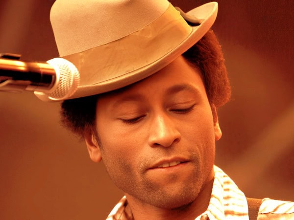 A sound archive image featuring a musician with a hat, capturing a moment of music history and cultural significance.