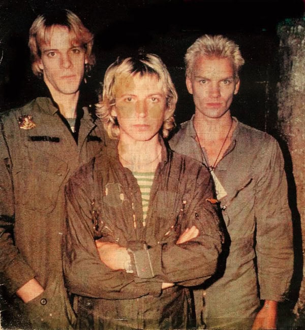 This image features the iconic band Depeche Mode, known for their influential music in electronic and alternative genres, captured in a promotional or backstage setting; perfect for showcasing music history and cultural impact.