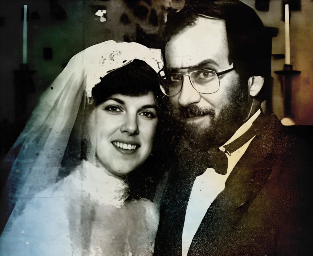 Bride and groom at wedding reception, vintage black and white photo, celebrating love and commitment, with a nostalgic feel.