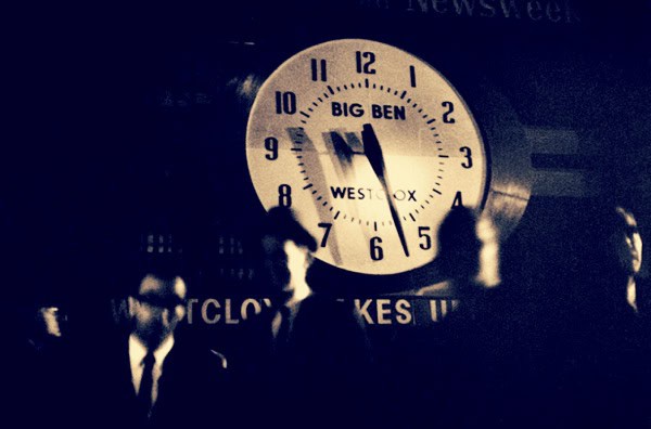 Big Ben clock face showing the time in a vintage black-and-white photo, evoking historical news and events linked to classic broadcasts and media archives.