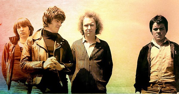 Archive photo of The Clash, iconic punk rock band, captured outdoors, promoting music and historical sound recordings, part of Past Daily's extensive news, history, and music sound archive.