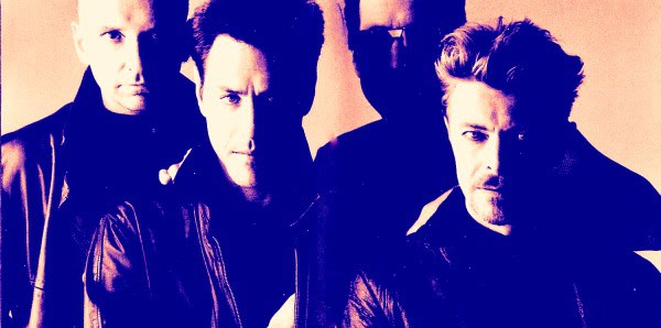 Vintage band photo of 80s rock musicians emphasizing music history and archival sound recordings for Past Daily archive. |.