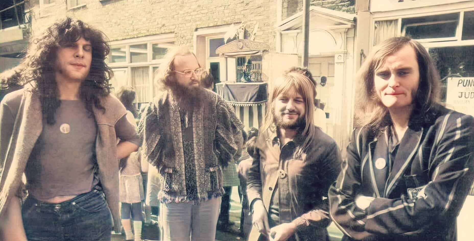 Vintage shot of a rock band outdoors during a music festival, capturing musicians with long hair and retro outfits, highlighting the history and culture of 1970s music events.