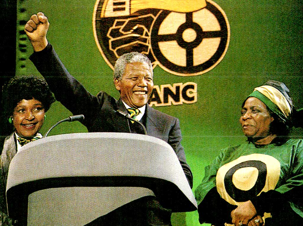 African National Congress (ANC) leaders delivering a historic speech at a political rally, symbolizing South Africa's struggle for freedom and anti-apartheid movement.