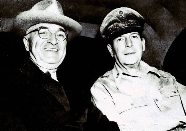 Penny Marshall and Mickey Rooney laughing at a historical event, covered by Past Daily news archives, celebrating classic TV and entertainment history.