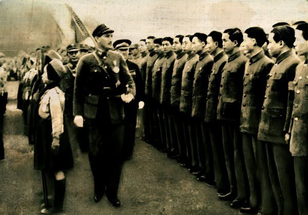 Medieval military officers inspecting soldiers during historical ceremony, black and white photograph, military uniform, discipline, leadership, historical event, past daily archive, news, history, music.