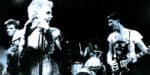 Donna-summer-performing-on-stage-at-night-1980s-music-concert-in-black-and-white.