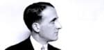 Vintage black and white profile portrait of a man with neatly combed hair, representing historical news and music archives.