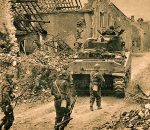 Severely damaged building with soldiers and a tank amidst destruction, capturing wartime destruction, military presence, and historical conflict scenes.