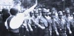Veterans and civilians during a historical protest or rally, with military helmets and attire, highlighting wartime history and social movements archived by Past Daily.