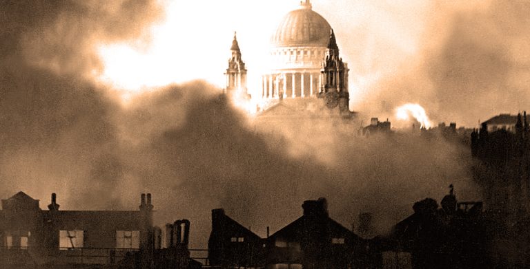 Destroyed st. paul's cathedral with smoke and fire during london blitz during world war ii.