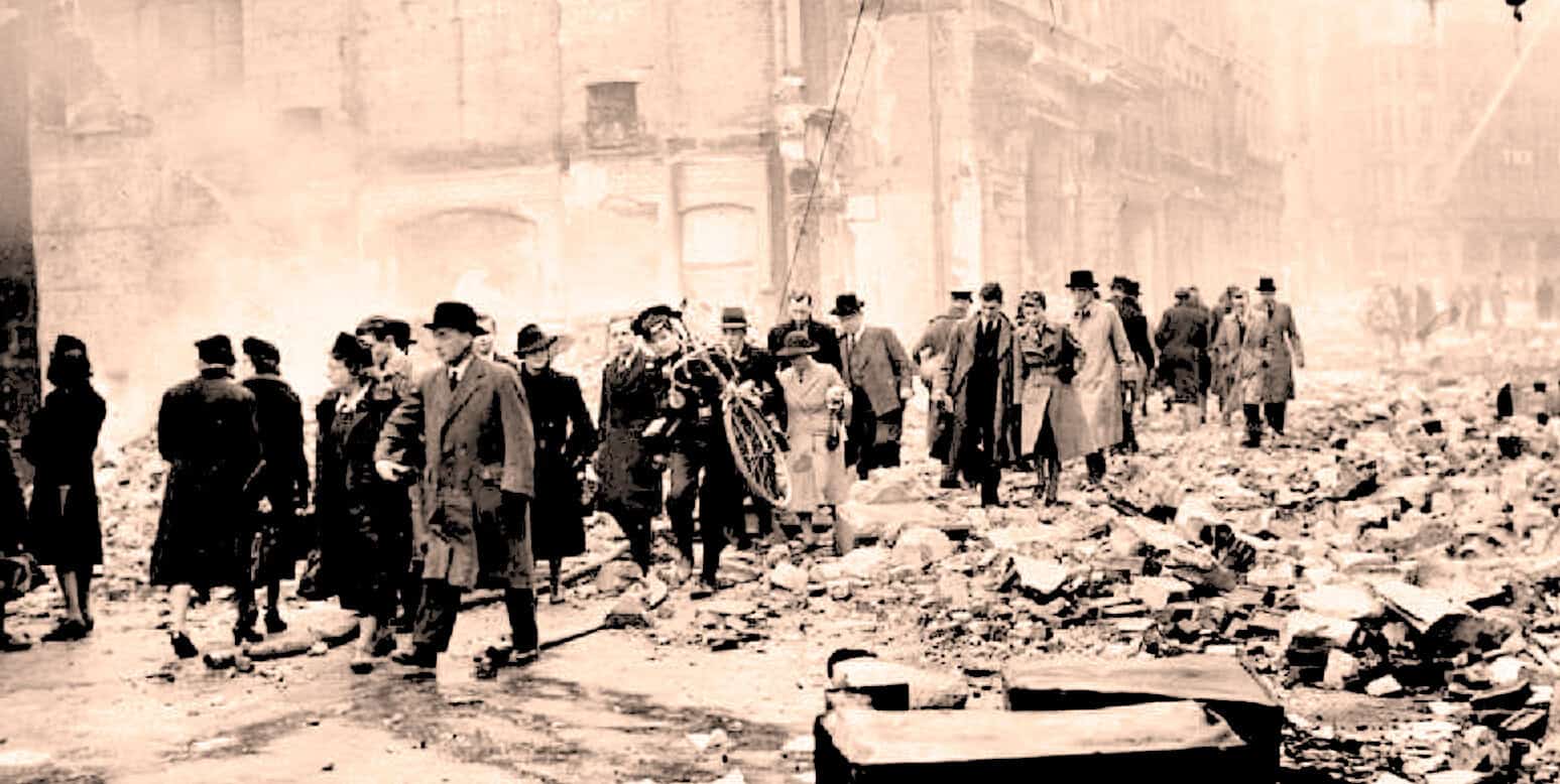 Destroyed urban street scene after an earthquake, with debris and rubble, showing historical damage.