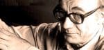 Insightful elderly man wearing glasses, reflecting nostalgia, history, and music, representing the timeless sound archive of past news and cultural recordings from Past Daily.