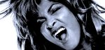 Intense woman screaming with wild hair, expressing emotion and energy, representing music, news, and historical sound archives from Past Daily.