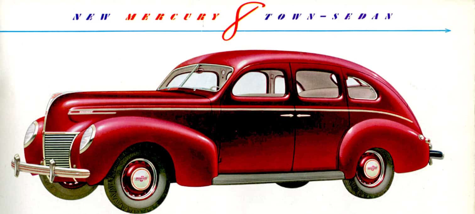 Red vintage Mercury car from the 1940s with "New Mercury" and "Town- Sedan" text above.