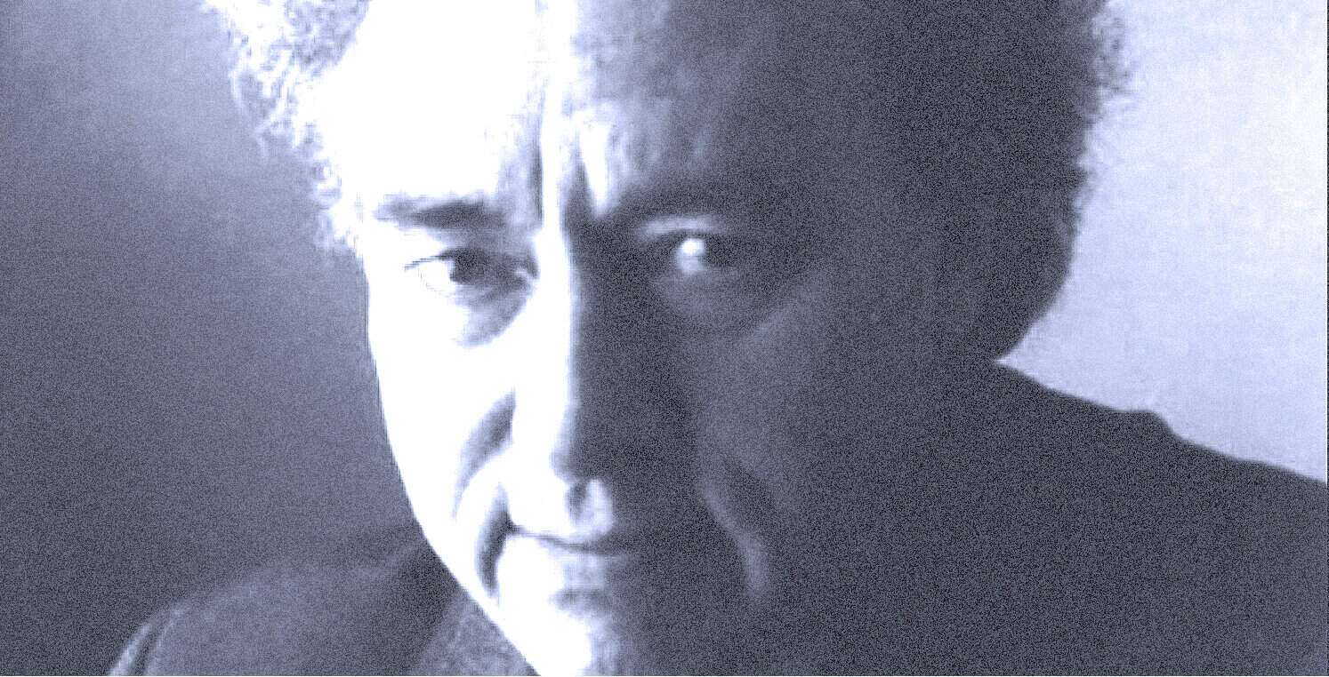 Black and white portrait of a man with intense expression, vintage radio host, nostalgic music and news archive, historical sound recordings, archival media footage, Past Daily.