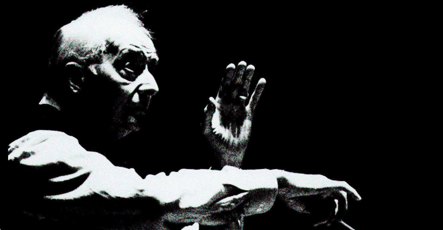 Vintage black and white image of Mahatma Gandhi in a contemplative pose, symbolizing peace and nonviolent resistance, related to historical news, movements, and social change archives.