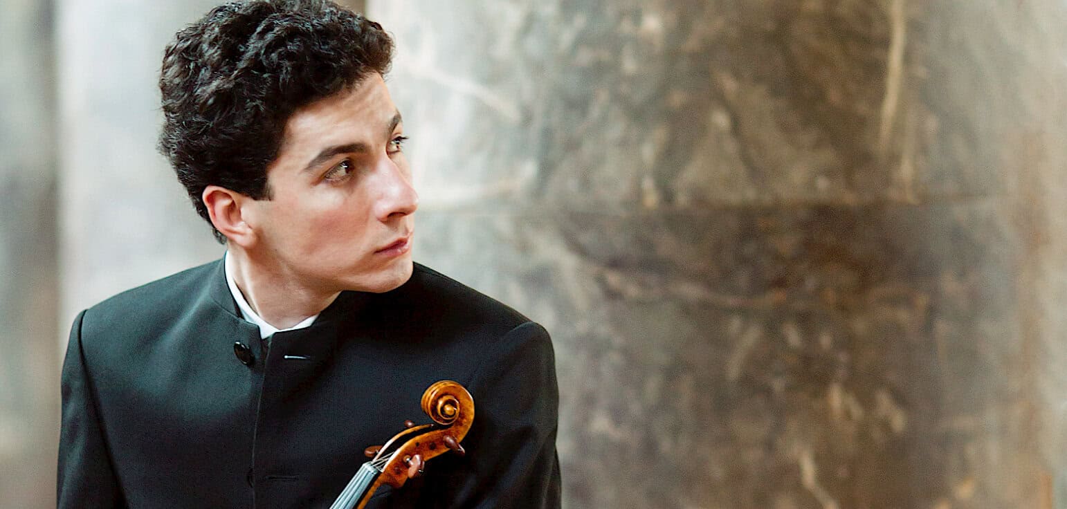 Vintage music archive featuring classical violinist, historic news, and timeless songs from Past Daily sound collection.