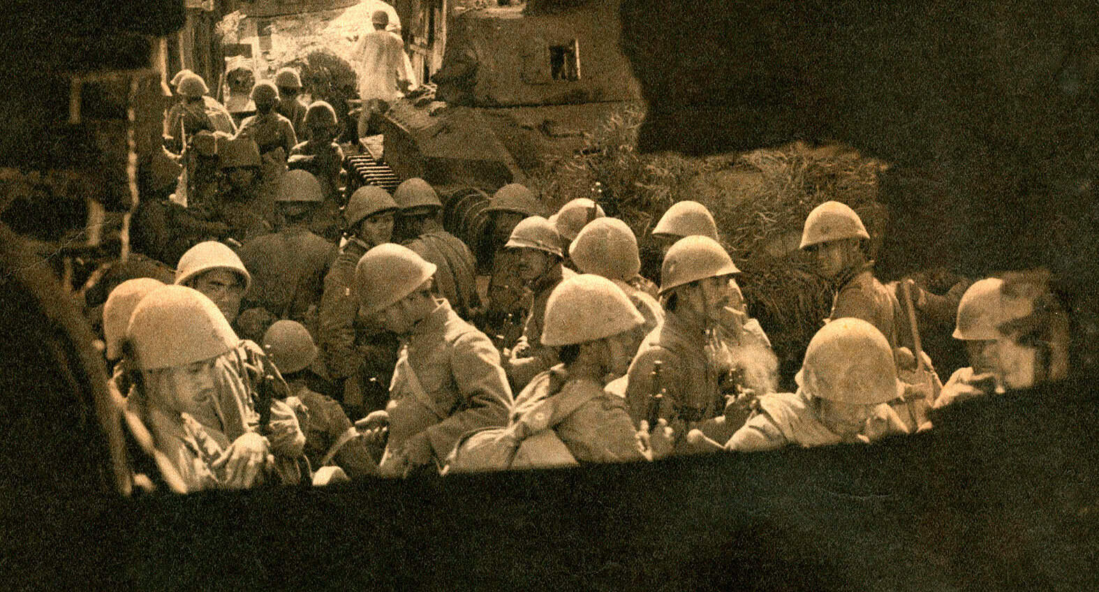 An image of soldiers in helmets during a historical military event, highlighting wartime history and news coverage.