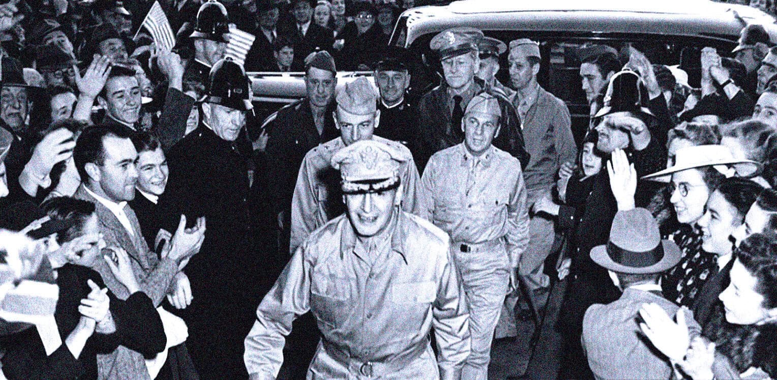 Soldiers and civilians greeting and welcoming a military figure at a historical event, black and white photo capturing a moment in news, history, and music archive.