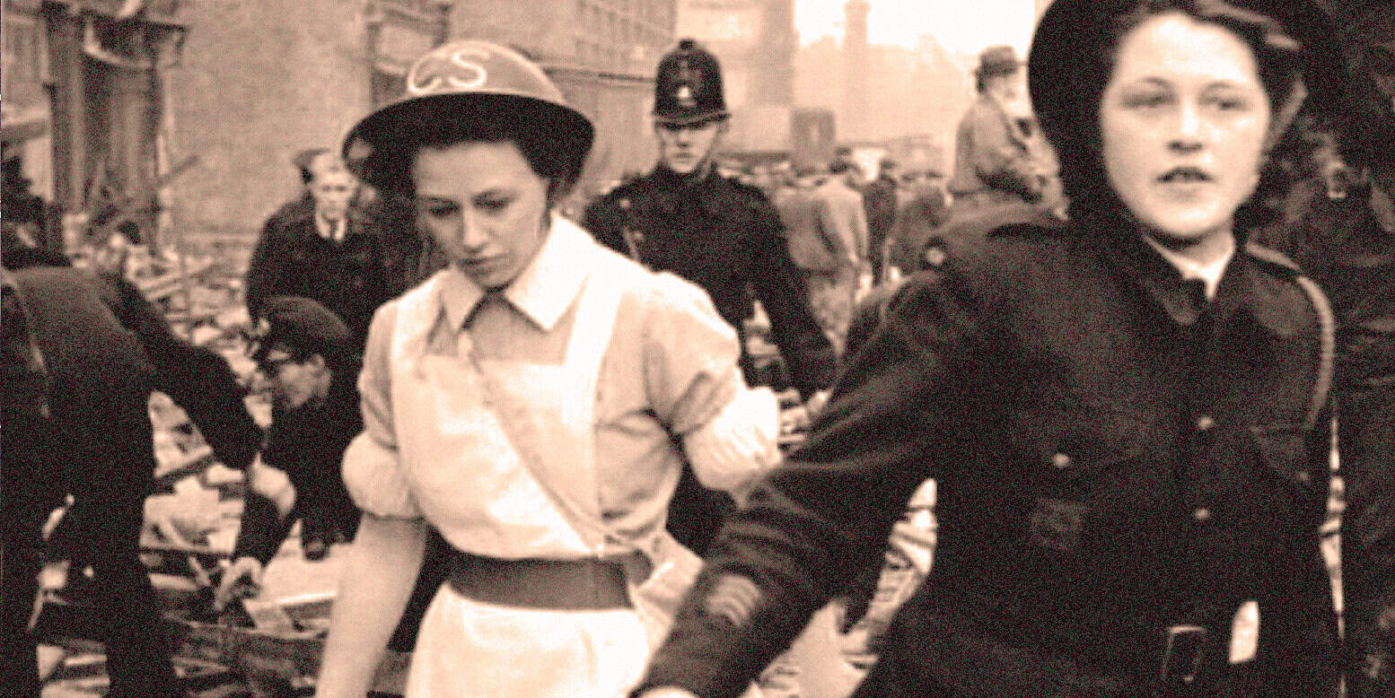 2. Police arresting women during a protest or civil unrest in a historical black-and-white photo.