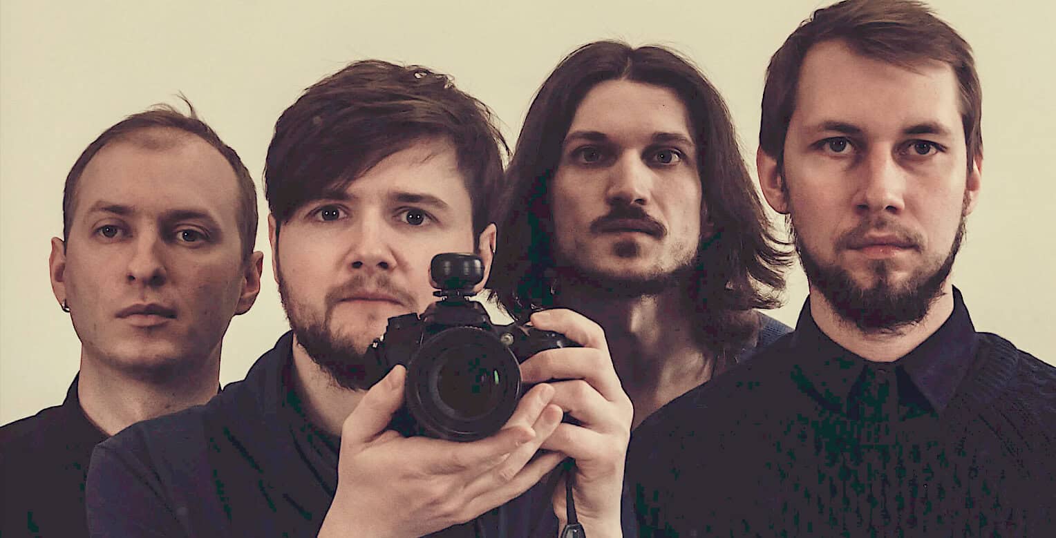 Vintage music band taking a selfie in a mirror, representing nostalgia, historical sound archives, and classic music collections. Focus on music history and audio preservation.
