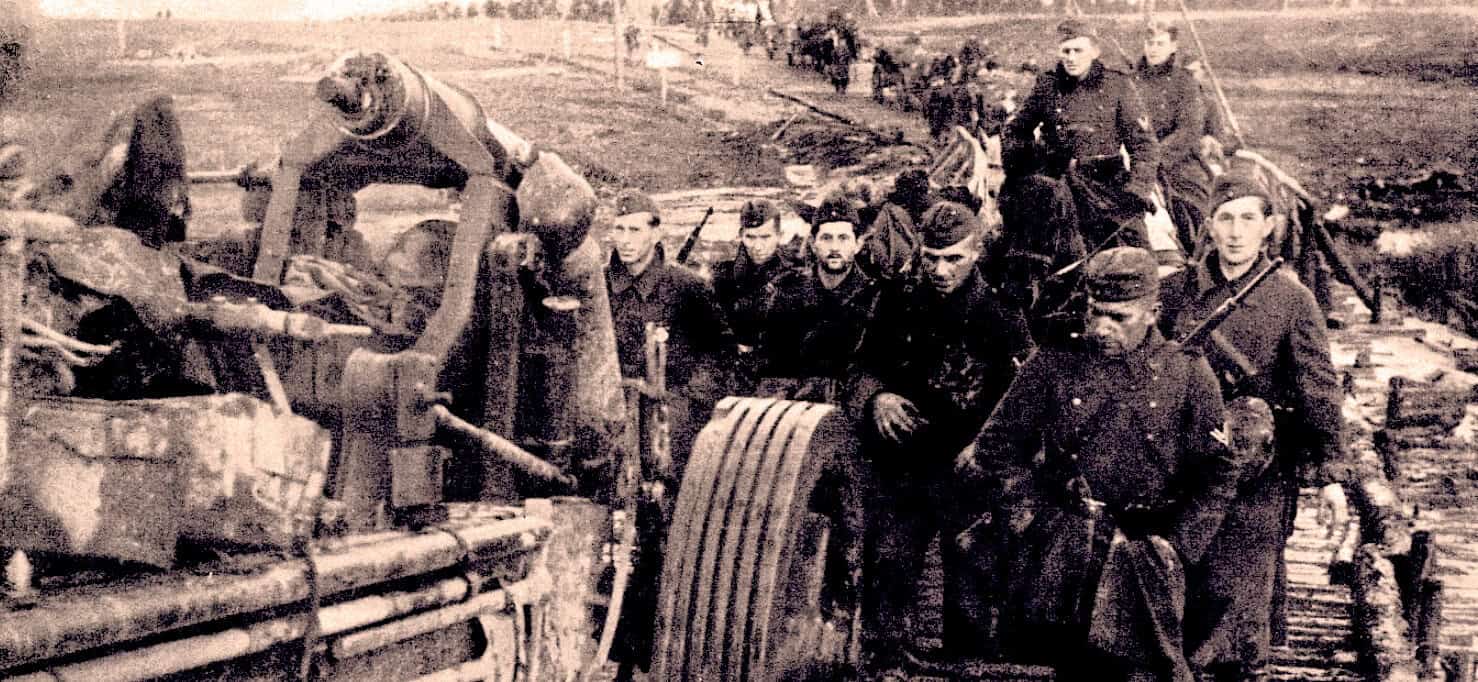 WWI soldiers resting in trenches during the war, historical military photograph documenting wartime life and combat scenes.