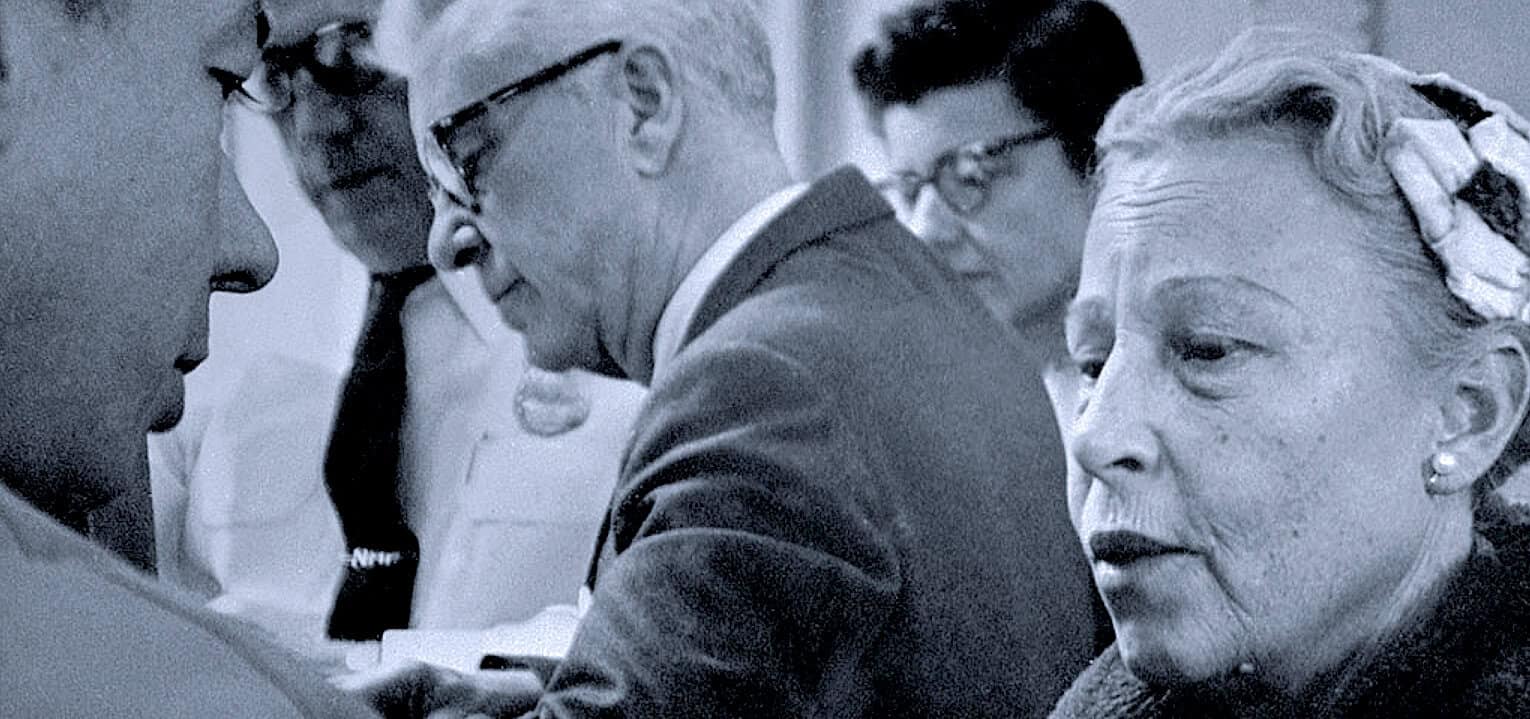 Historical political meeting or discussion, black and white photo, news archive, vintage image, government officials, past daily sound archive, history and music, news and media imagery.