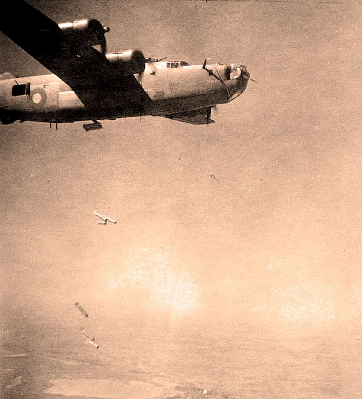 A vintage aircraft in flight during a historical event, captured in sepia tone, highlighting mid-20th-century aviation and military history.
