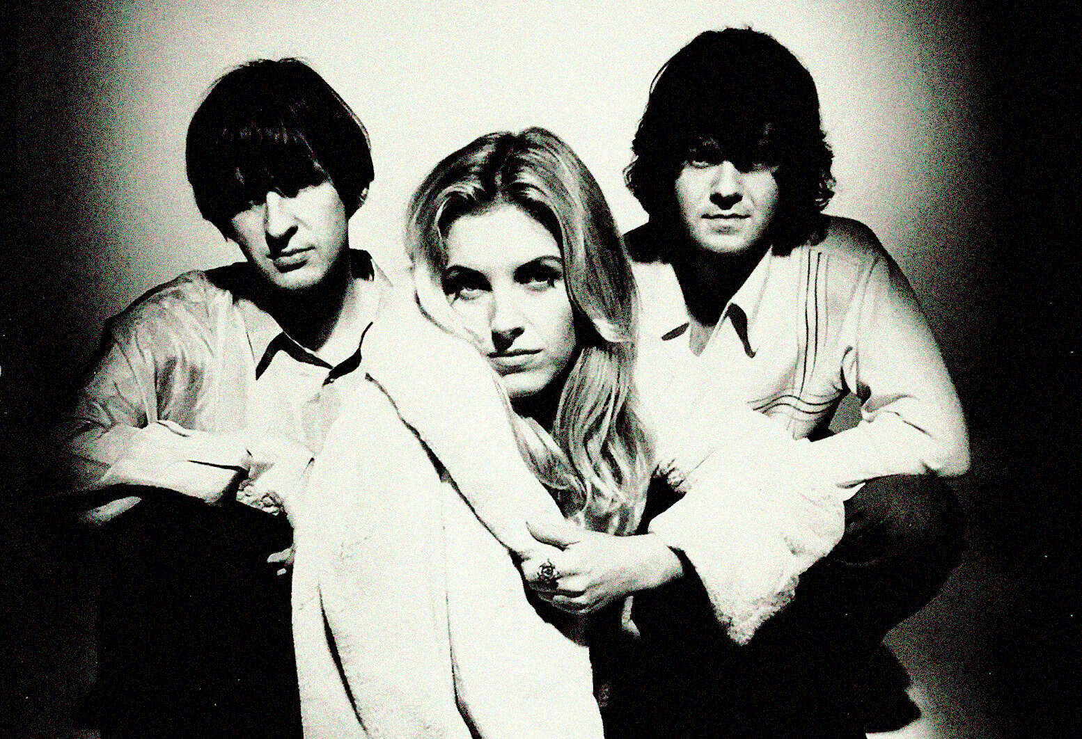 Black and white photo of The Mamas & the Papas, an iconic 1960s American folk rock vocal group, highlighting their influential music and history in the music archive.