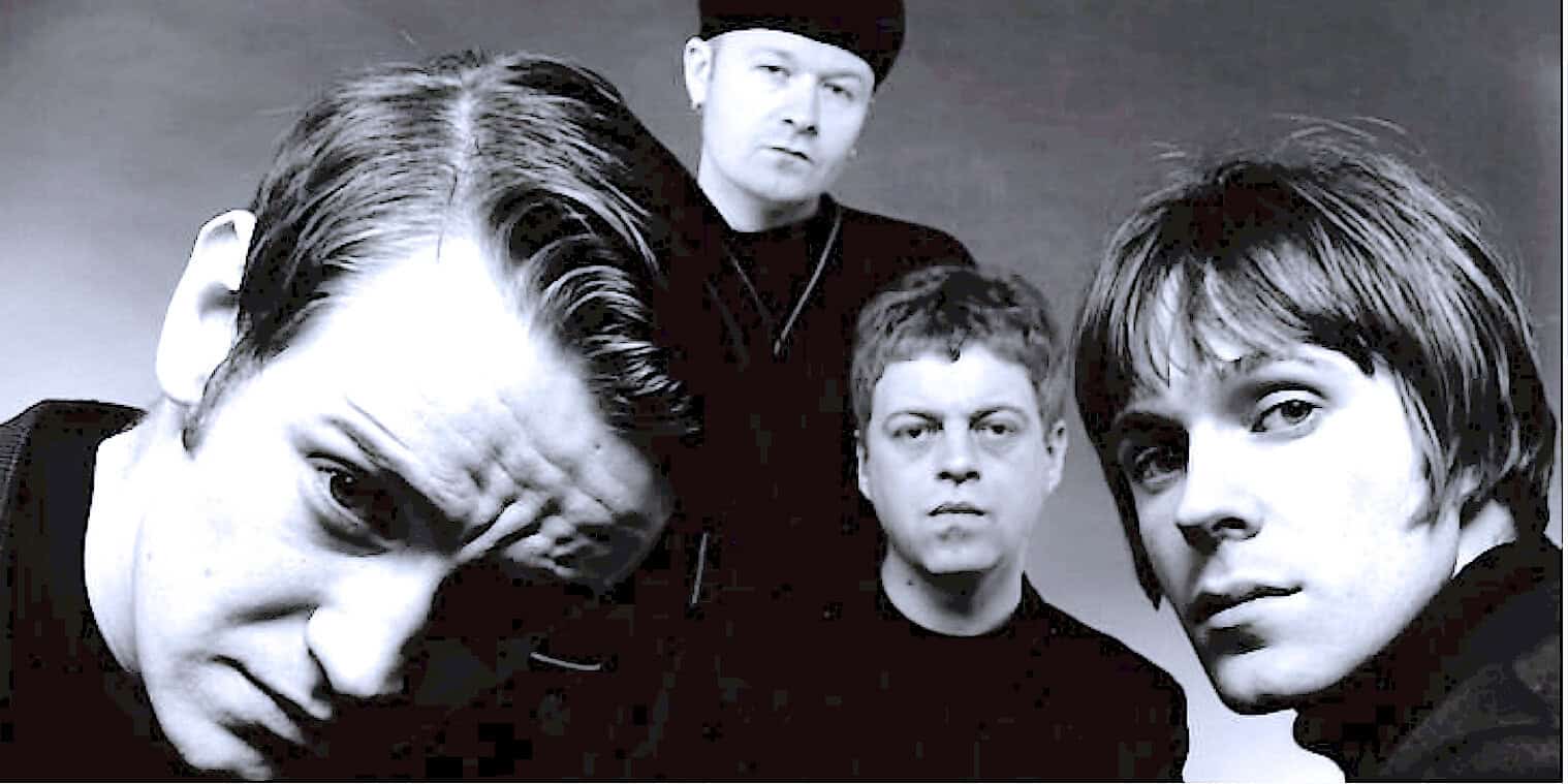 A Sound Archive of News, Music, and History featuring The Smiths, iconic 80s alternative rock band, in a black and white promotional photo.