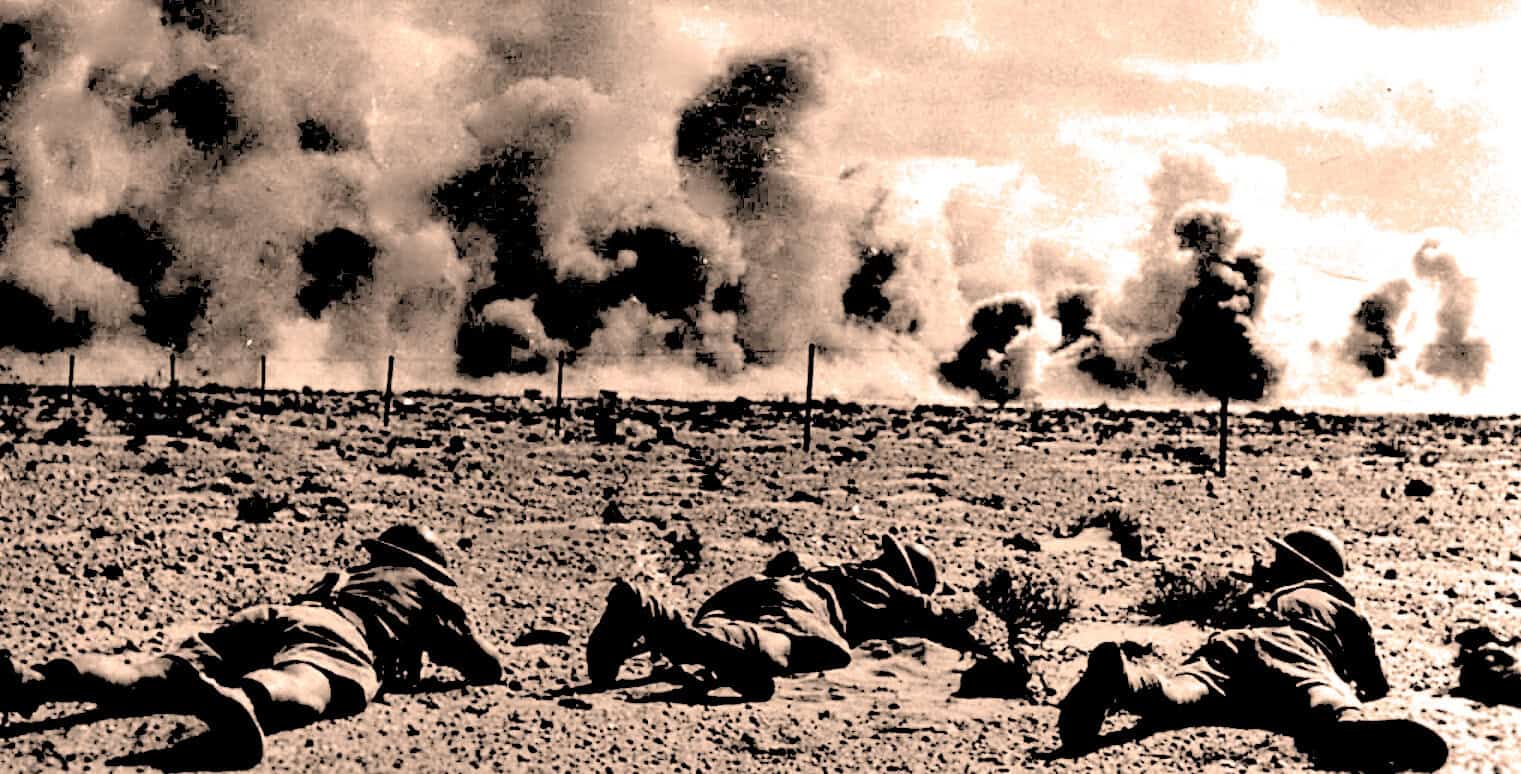 Climbers under smoke and explosions, historical war scene, black and white photo, documenting wartime events, military engagement image.