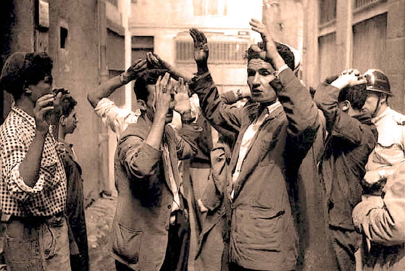 Road protest activism in urban streets during social and political upheaval, capturing historical moments of civil resistance and community engagement.