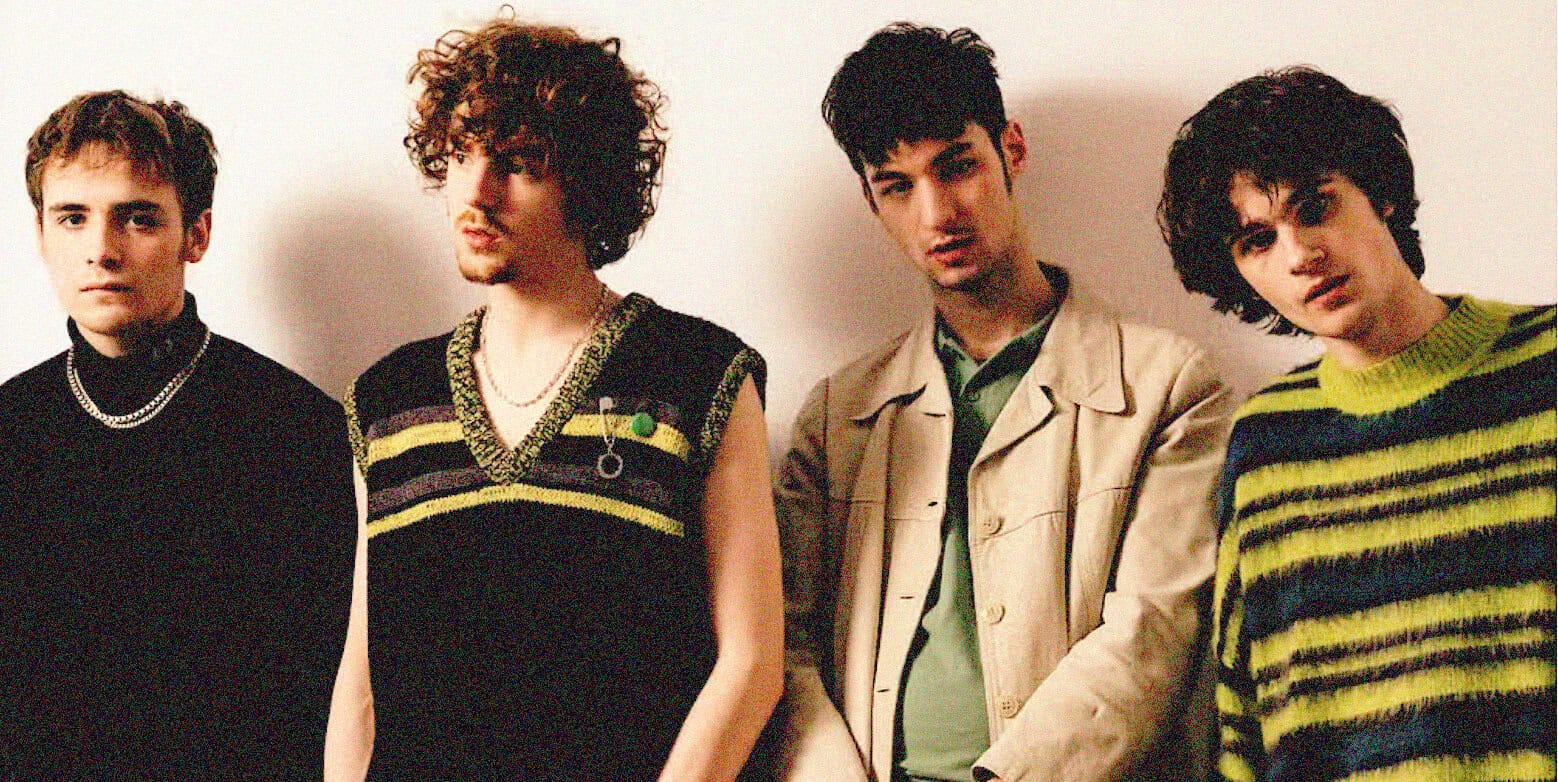 Teenage indie band members posing together, showcasing vintage fashion and hairstyles, representing music history and culture from the 1980s or 1990s.