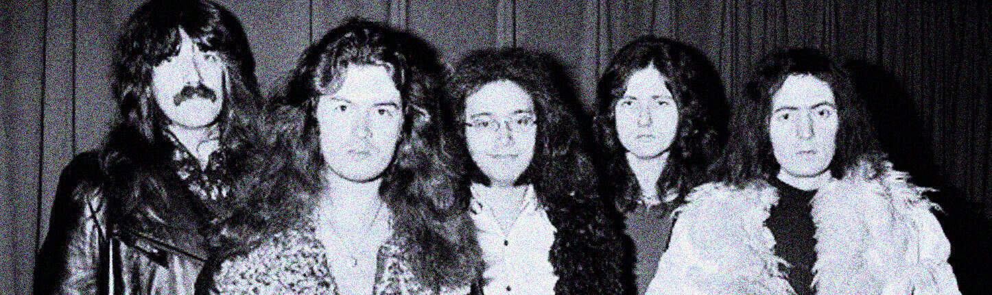 Vintage rock band photo featuring women musicians, reflecting music history and iconic sound archives, ideal for nostalgic music lovers and history enthusiasts.