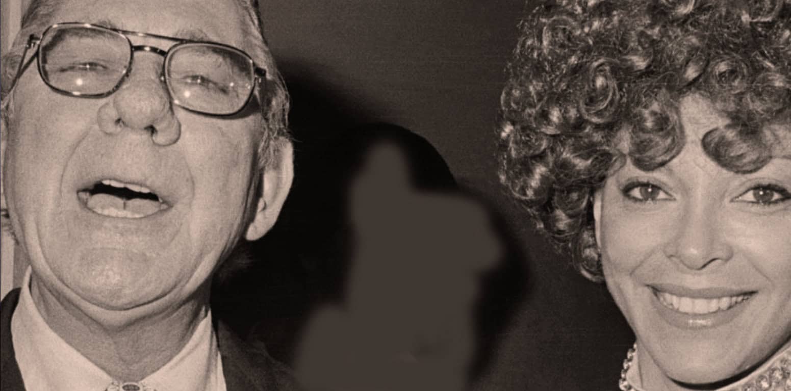 Vintage black and white photo of an elderly man wearing glasses and a suit, and a woman with curly hair smiling, related to historic news, music, and radio archives.