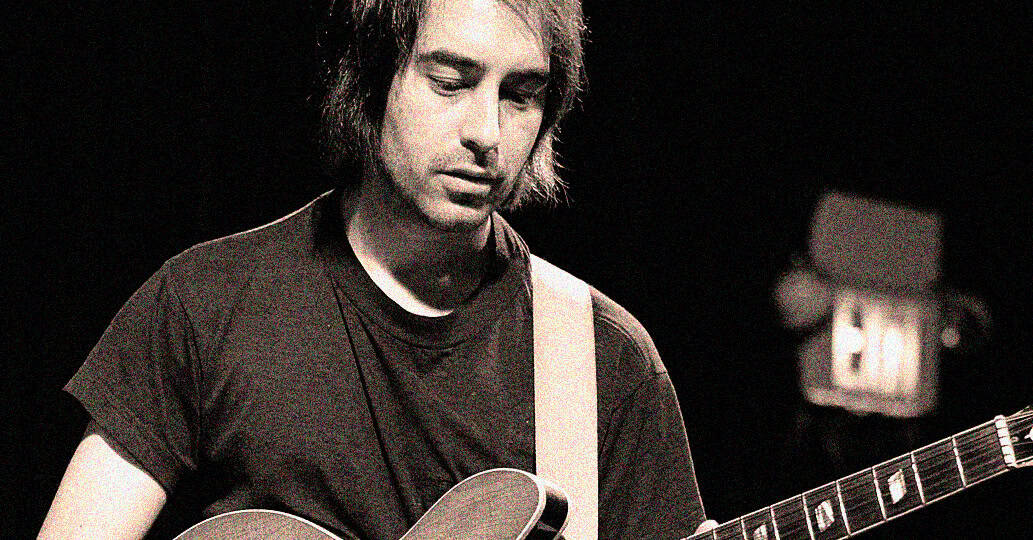 File-name: past-daily-music-archive-guitarist-black-and-white.jpg.