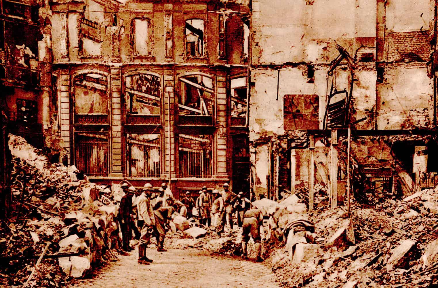 Ruined building and destruction after a historic event, with workers or soldiers in the foreground amid debris and rubble, capturing the aftermath of a major disaster or war, related to history and historic news archives.