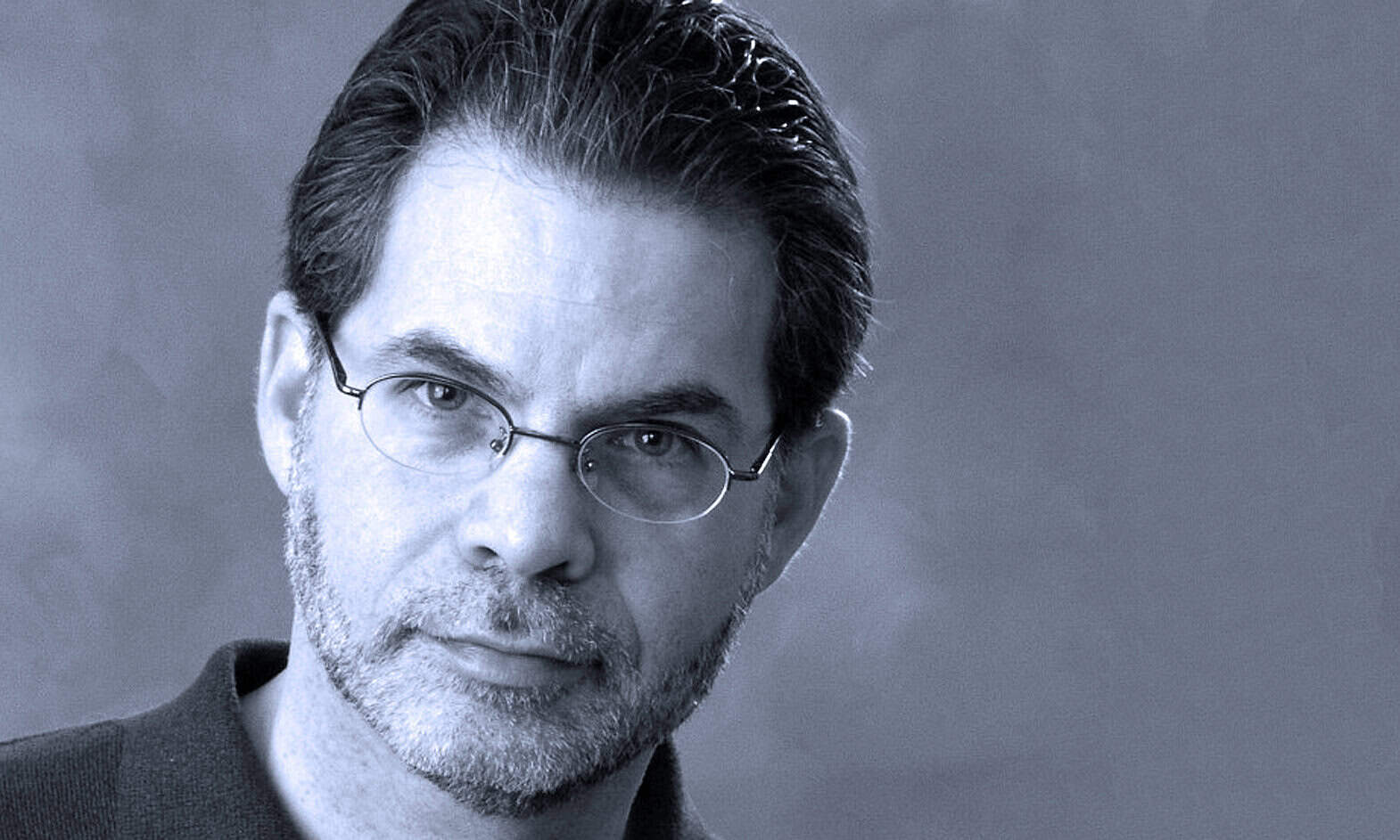 Thoughtful man with glasses, black and white portrait, academic or professional, historical image, intellectual user.