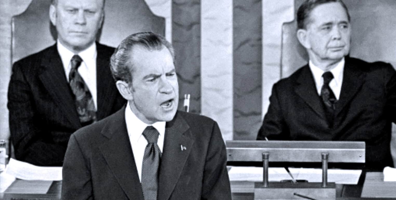 Journalists in a courtroom, black and white news archive image, historical courtroom news, political debate, classic news reporting scene.
