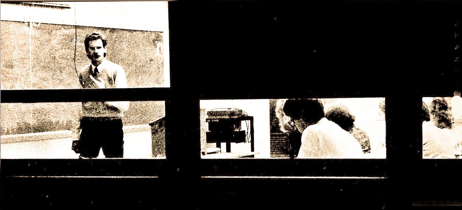 Old black-and-white photo of people in a recording studio or radio station, capturing historic moments of music, news, and media archives, representing Past Daily's sound archive of history and news.