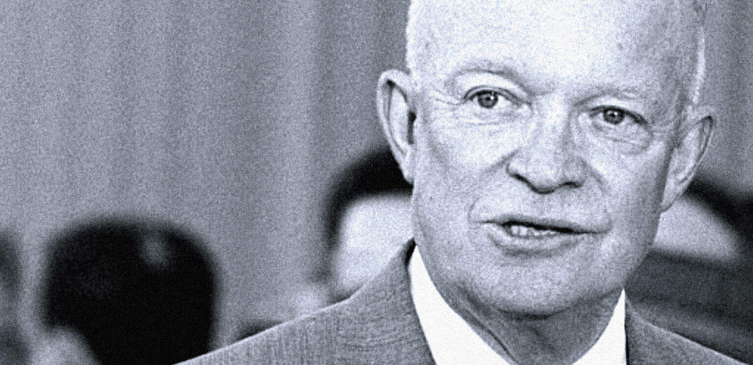 Black and white photo of a distinguished man in a suit during a historical news event, representing past news, history, and archival music recordings.