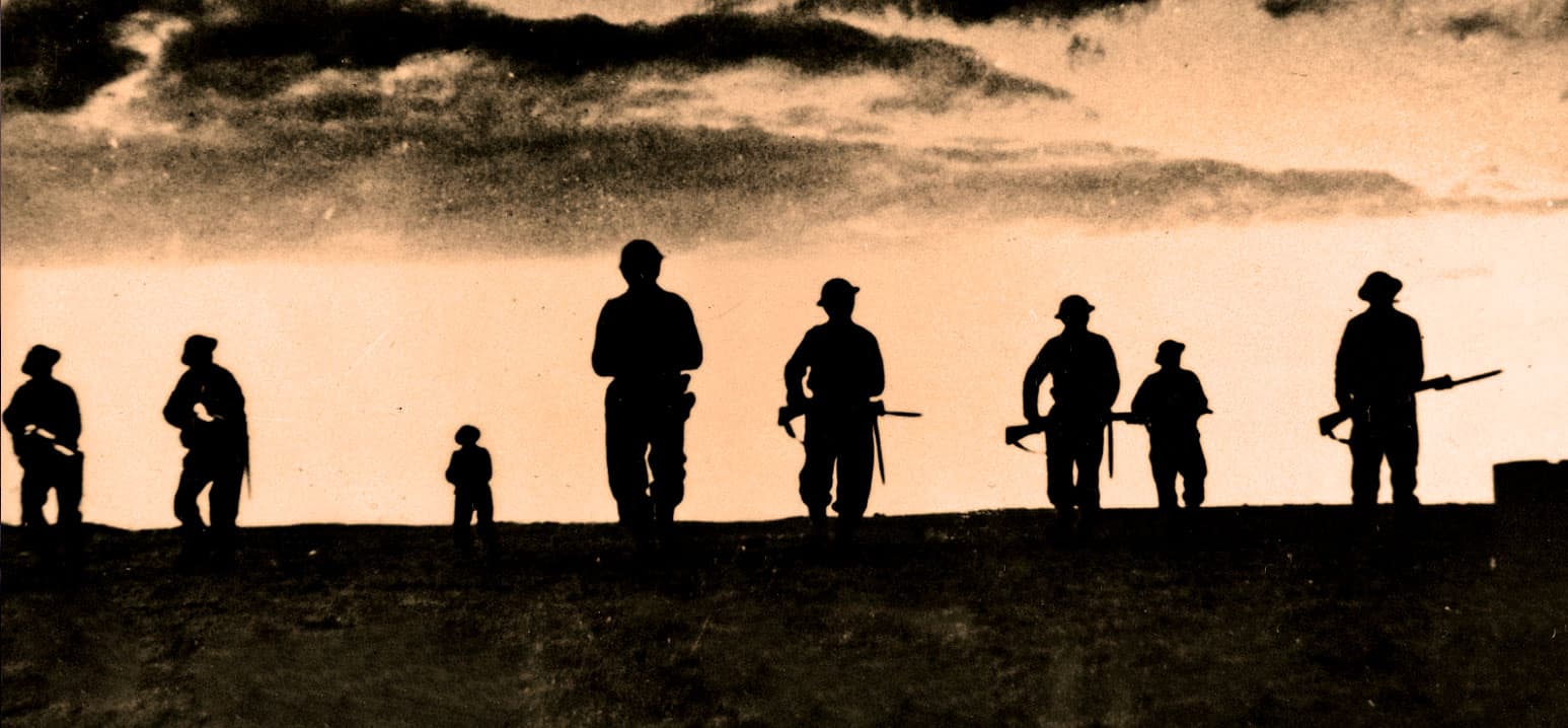Silhouetted soldiers during war or military drill at sunset, historical military scene, dark figures with rifles against evening sky, vintage black and white photo, military history, war remembrance, past daily: a sound archive of news, history, and music.