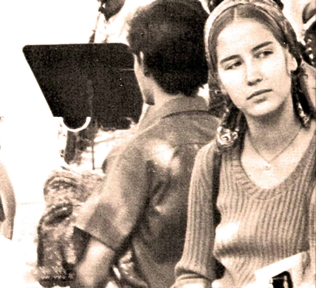 Vintage black and white photo of young women with radios, representing historic news, music archives, and cultural history.