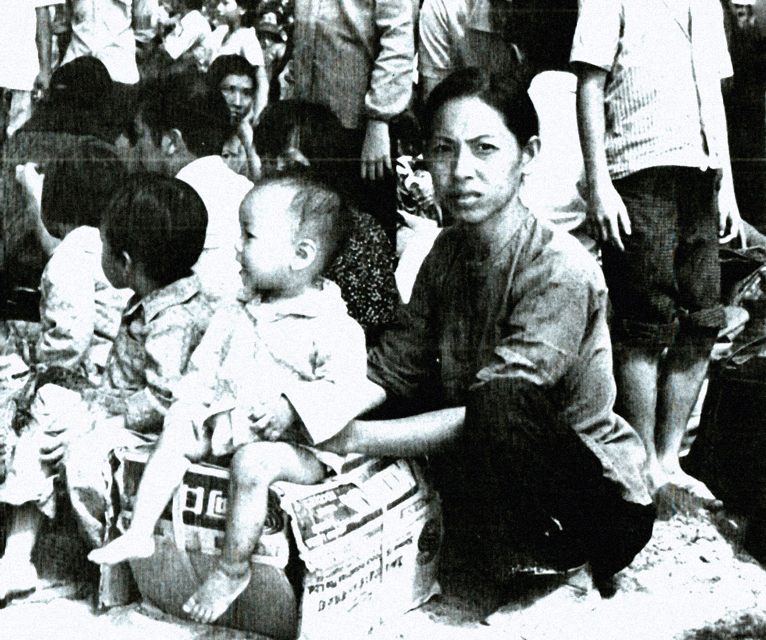Haitian woman and children in a crowded market, historical news archive, capturing daily life in Haiti, part of a sound archive of history and culture.