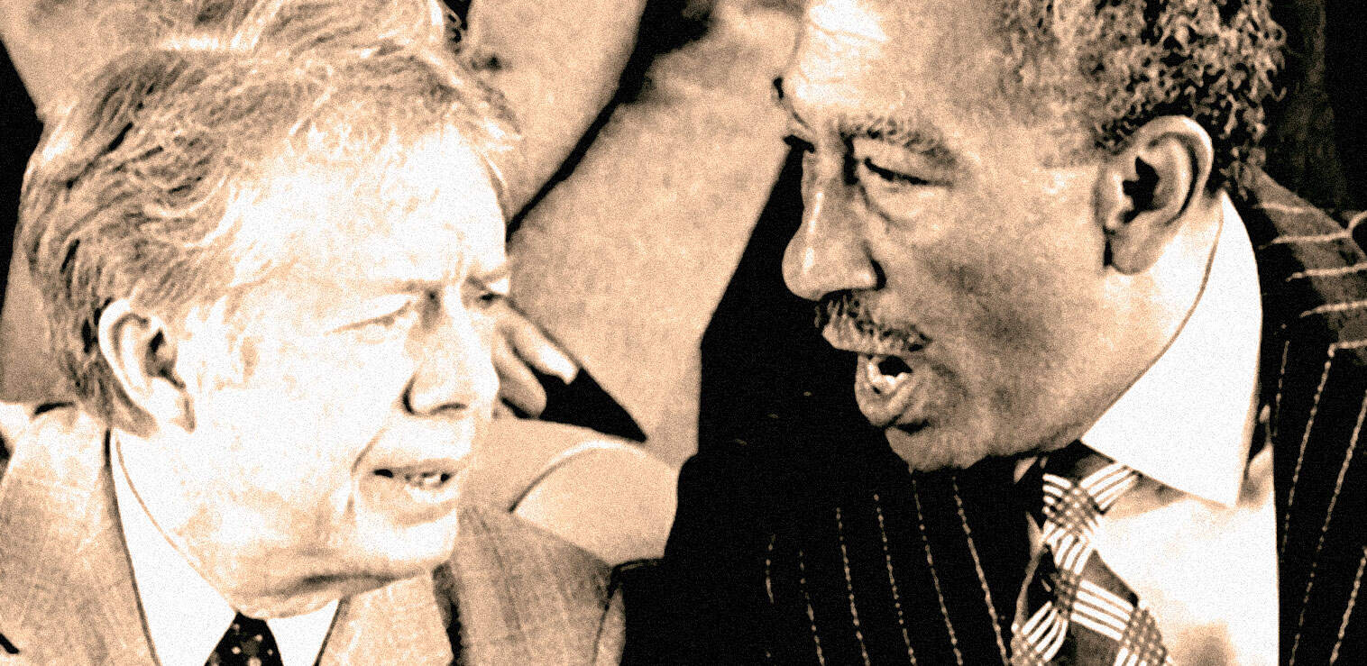 Close-up of two men having an intense conversation, highlighting historical news, politics, and notable events from past archives.