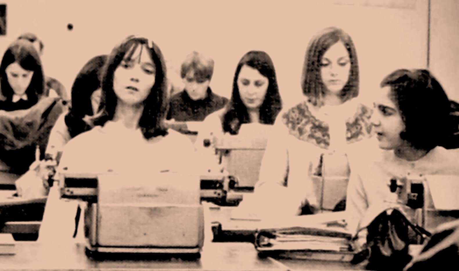 Vintage women working in a newsroom or media setting, representing news, history, and radio broadcasting archives associated with Past Daily.