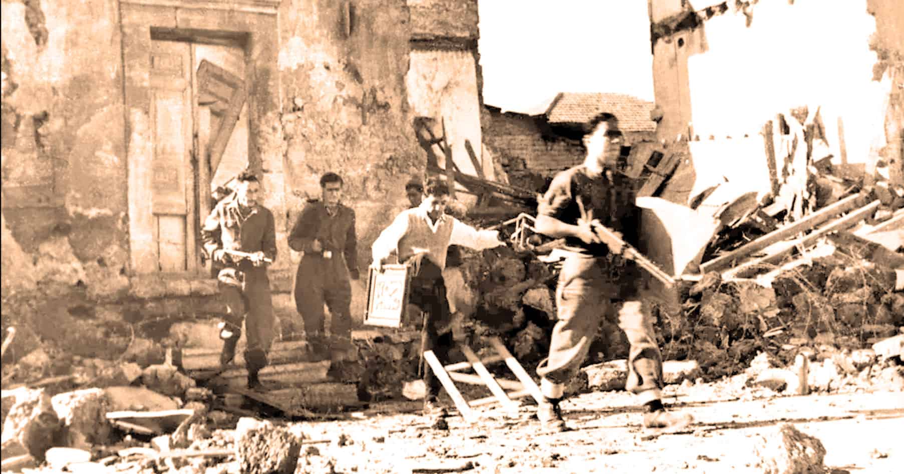 Old black-and-white photo of people clearing debris after a disaster, highlighting history and community resilience.